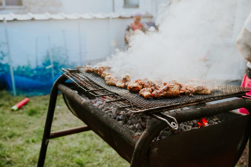Smoky BBQ wings over slow-smoked style